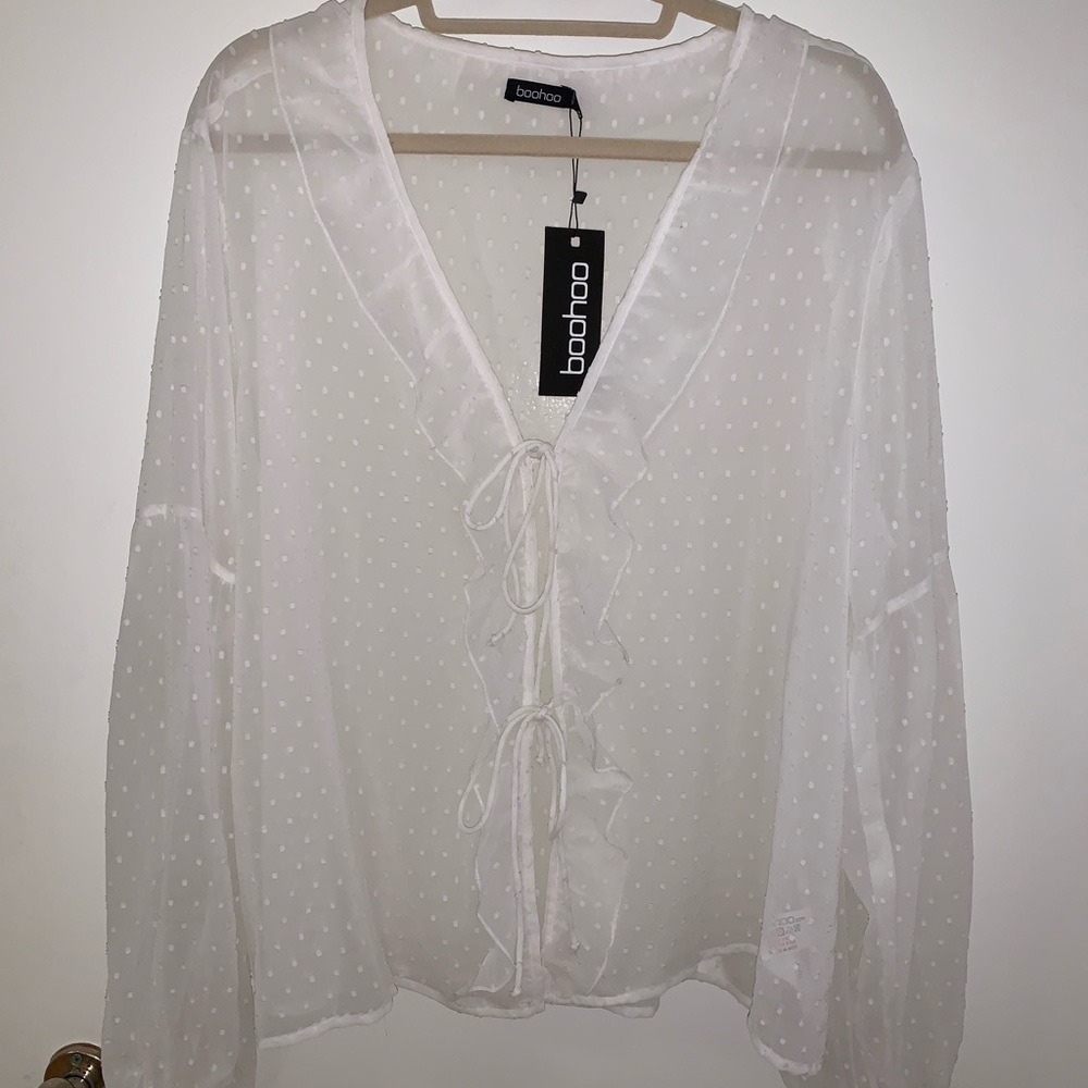 Sheer dotted tie up blouse